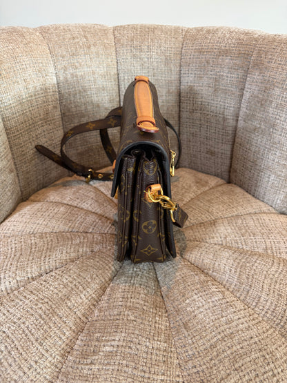 Louis Vuitton Pochette Metis in brown canvas, back view
