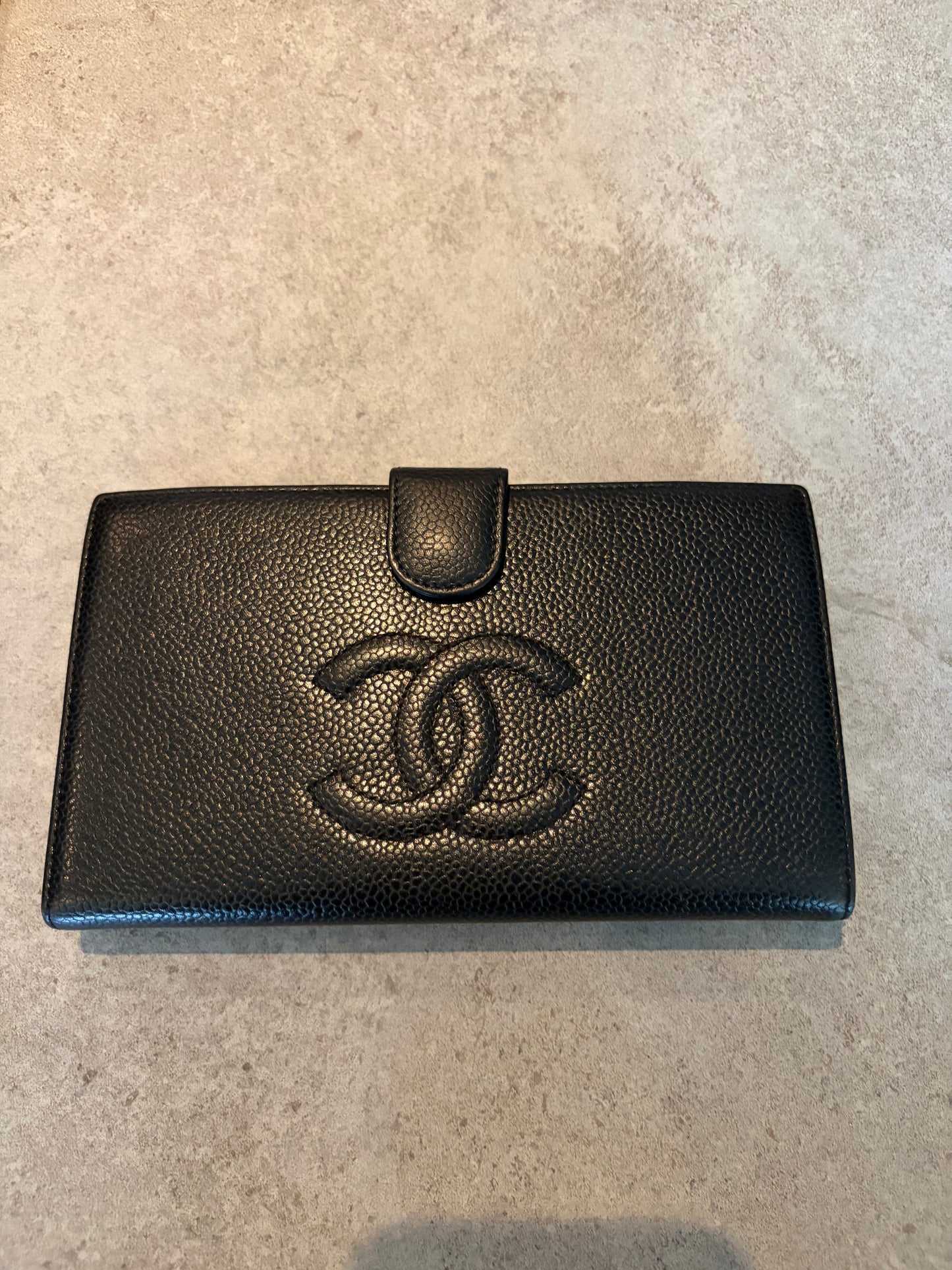 Chanel Timeless CC wallet in black caviar leather, front view