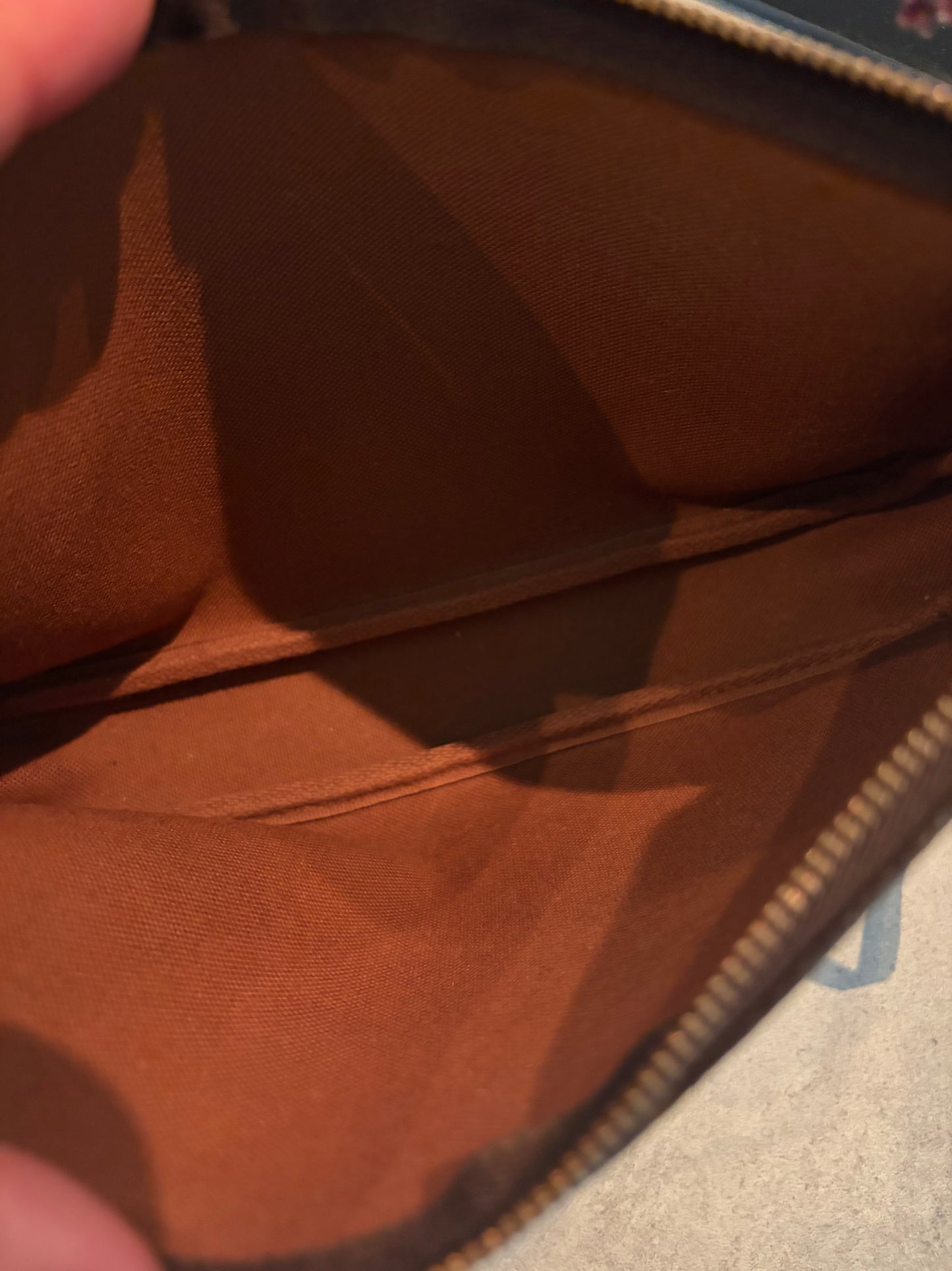 Louis Vuitton Pochette Accessoires Monogram Canvas, condition detail
