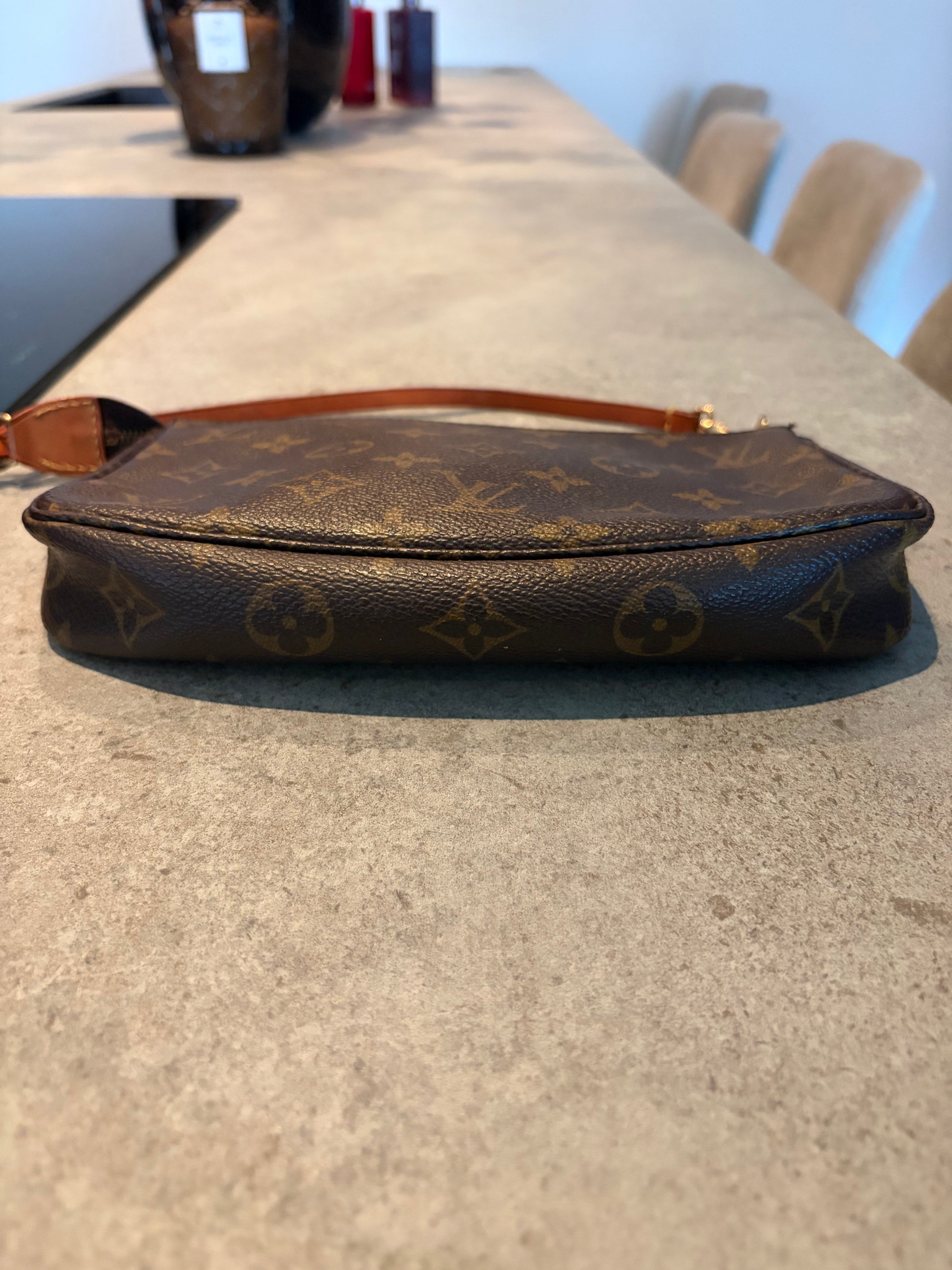 Louis Vuitton Pochette Accessoires Monogram Canvas, close-up
